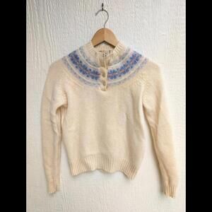 Cozy Cream Sweater with Blue Accents